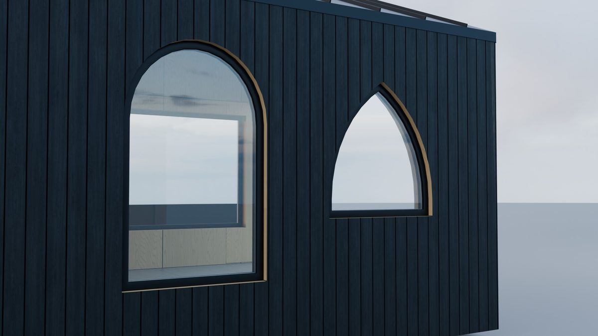 A round-arched and a Gothic window side by side