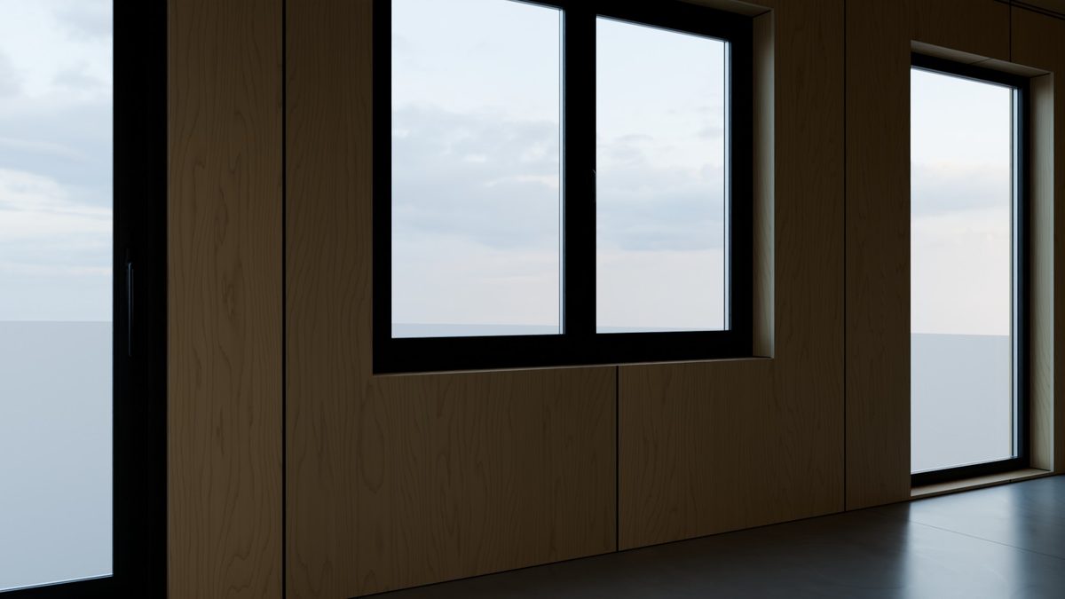Double window seen from the plywood-lined room