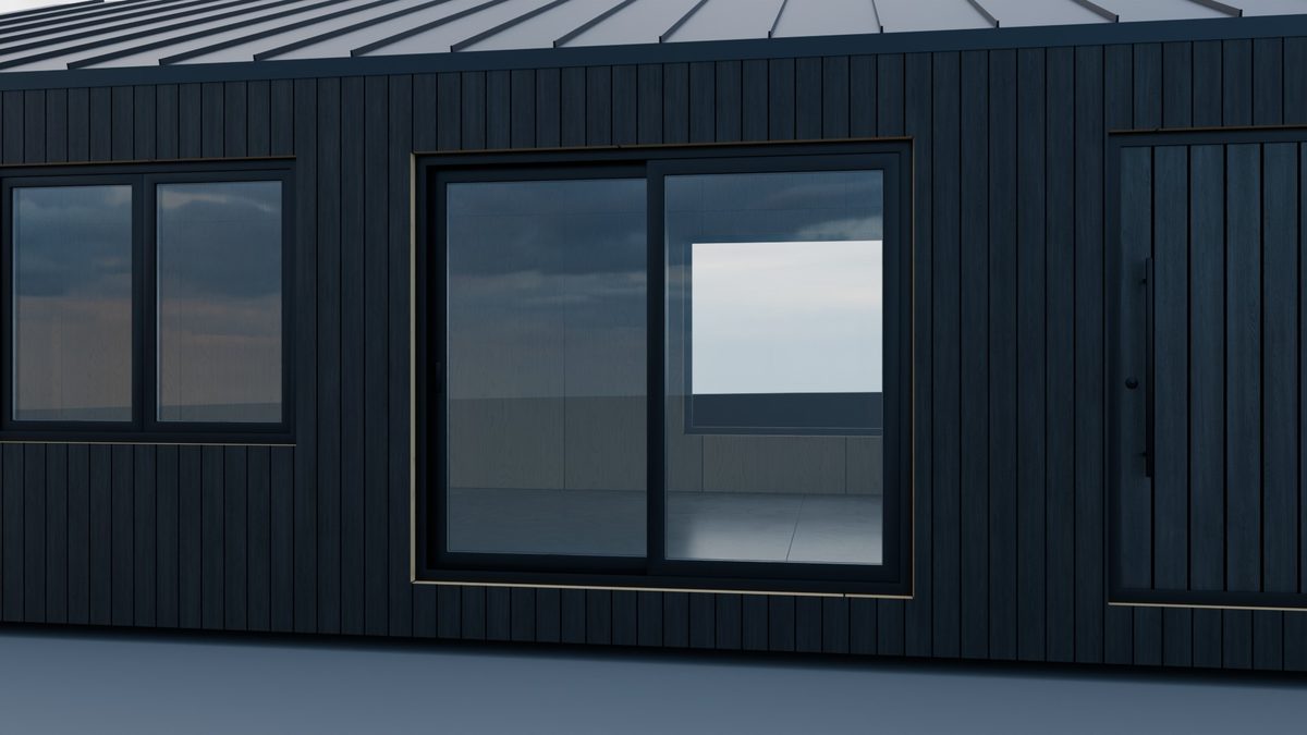 Lift-and-slide door in a long wall
