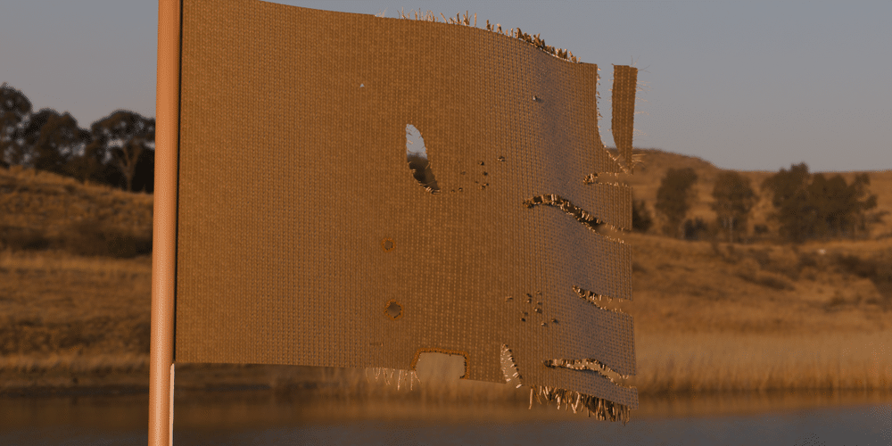 A flag waving in the wind tears at its free end, burns and takes shot holes while it moves