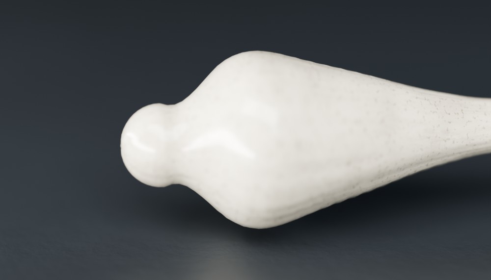 Close-up: the onion butt and bone grip of Dark Arts