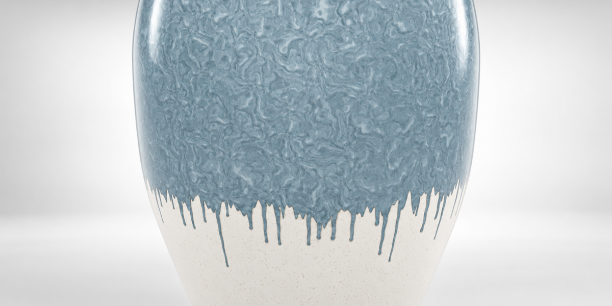 Close view of the flowing transition between blue and ivory glazes